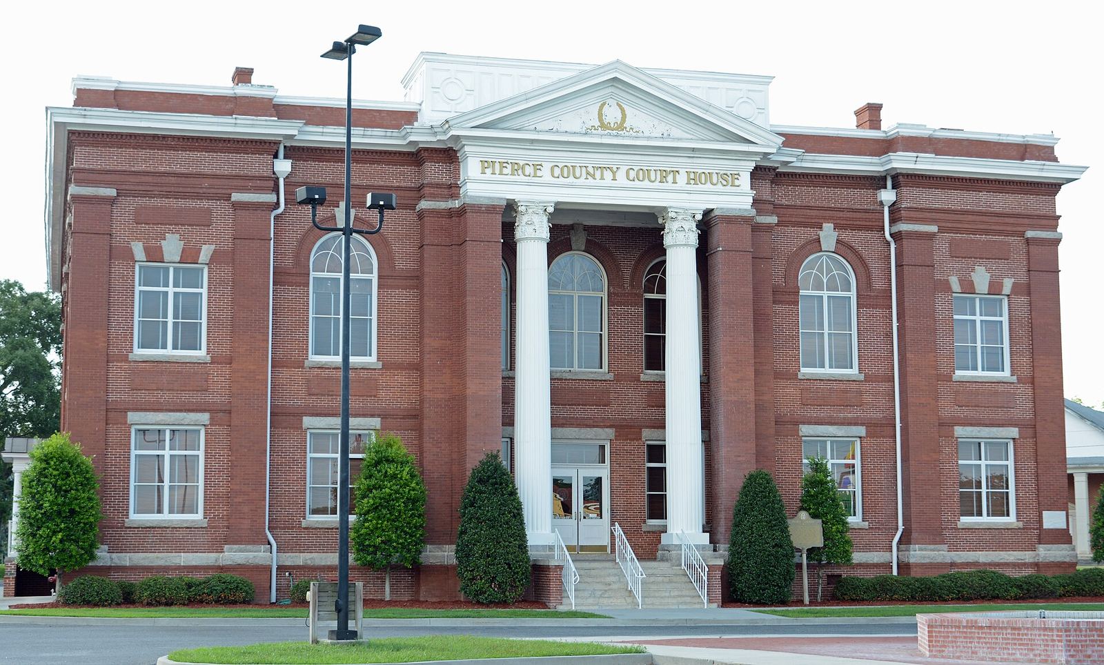 The Pierce County Courthouse in Blackshear, a red-brick building with white columns